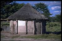 Wood_post_hut_Maun.jpg